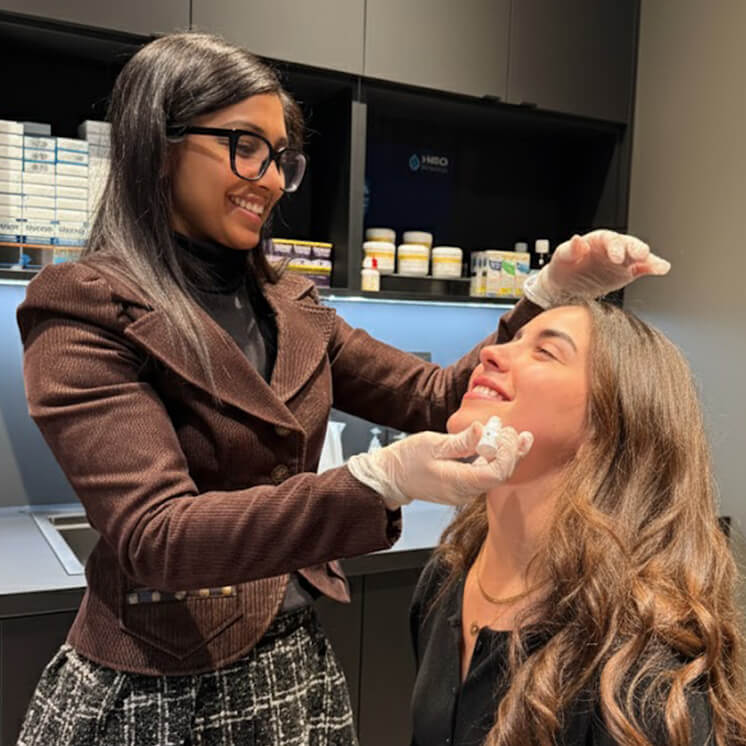 Dr. Harina Thyriar guiding a patient during eye drop application as part of a personalized eye care protocol.