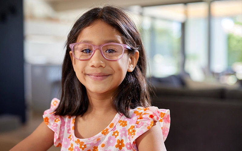 Child wearing Essilor Stellest 2.0 lenses for myopia control